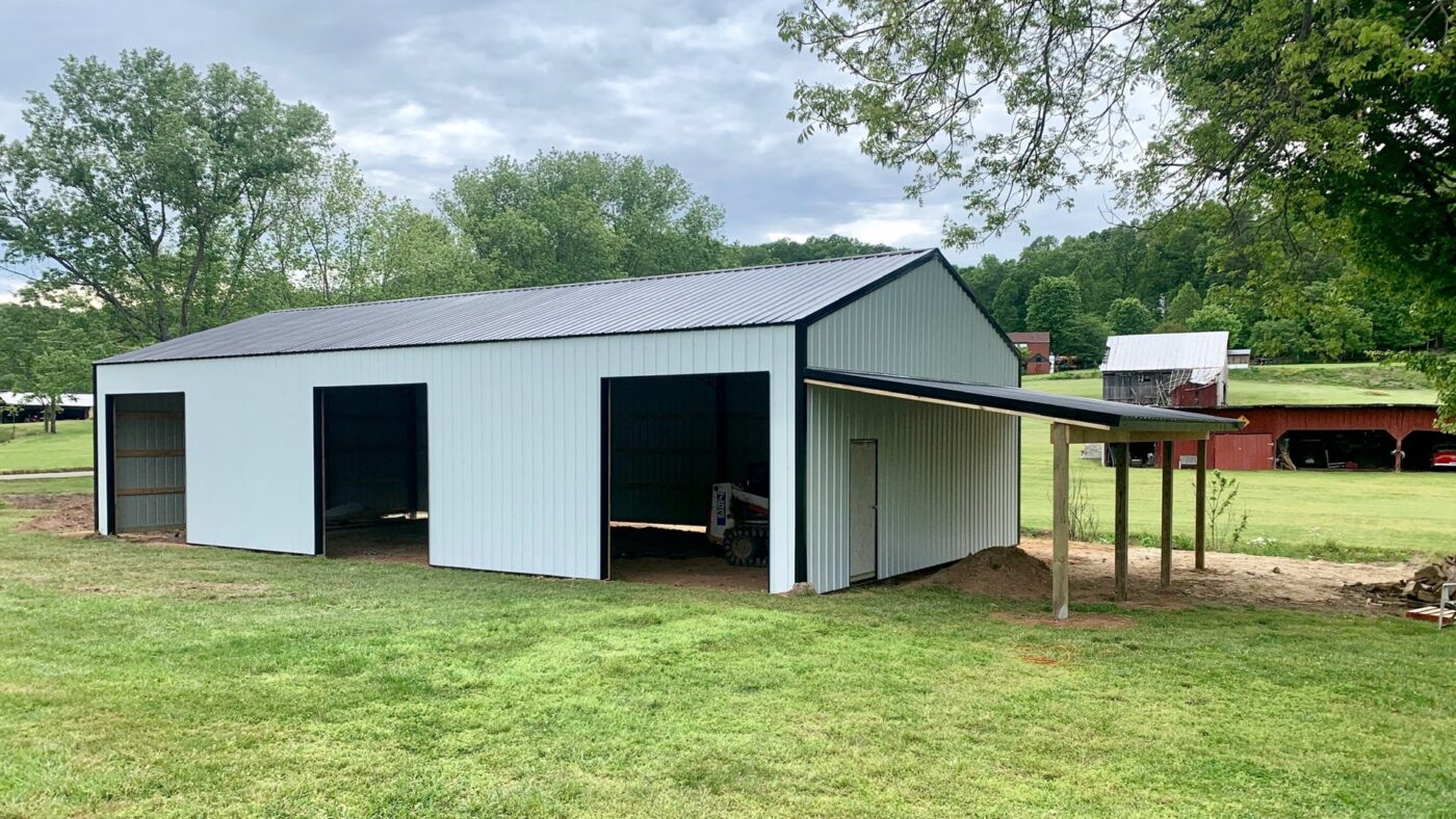 A pole barn with a pole barn post frame.