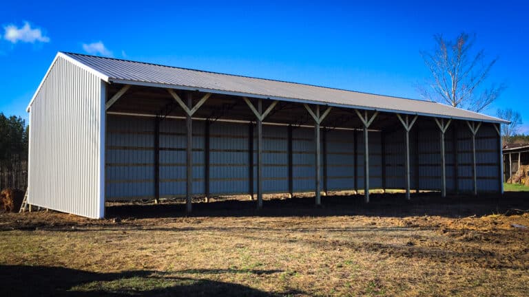 pole barn equipment shed gray blue sky