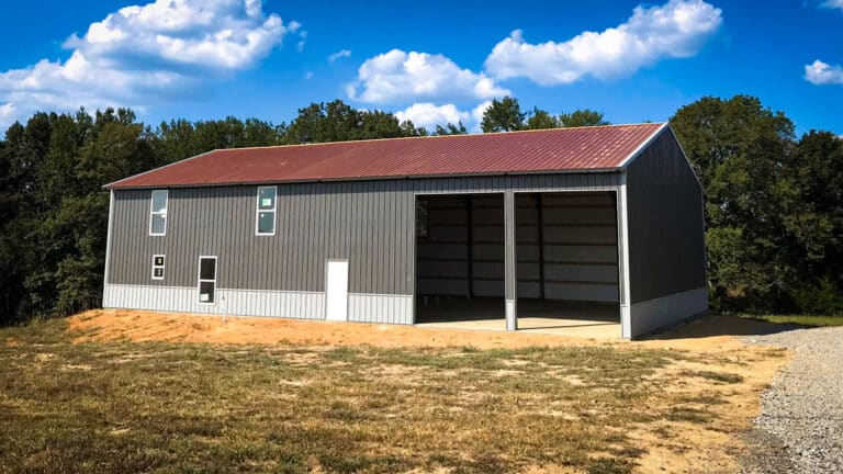 pole barn garage gray with red and white trim