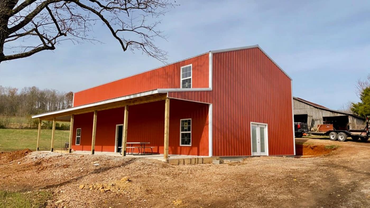 metal building with a lean pole barn style